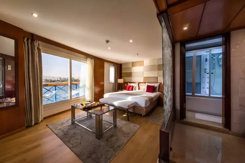 Relax in your comfortable cabin aboard the Esmeralda Nile Cruise